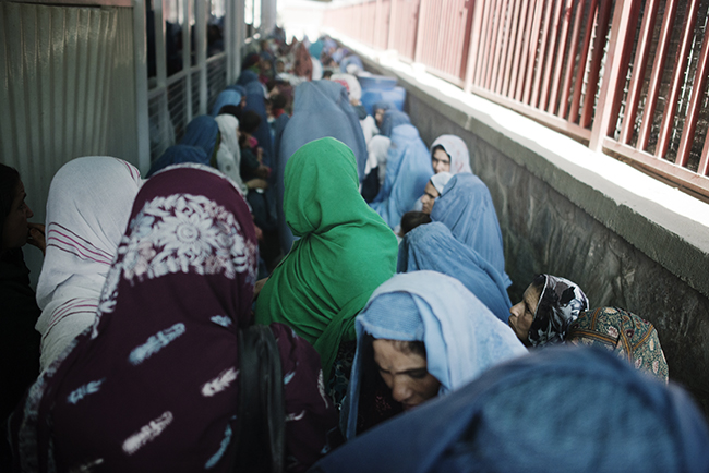 Women wait in line for health care at MSF’s Ahmed Shah Baba Hospital in Kabul, Afghanistan. Over 600 patients come through the hospital a day for free, high-quality care. Photo by Andrea Bruce/Noor Images