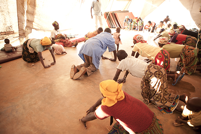 An MSF physiotherapist conducts a daily session with women who have gone through fistula repair surgery and now must faithfully perform strengthening exercises to help in their recovery. Photo  by Martina Bacigalupo