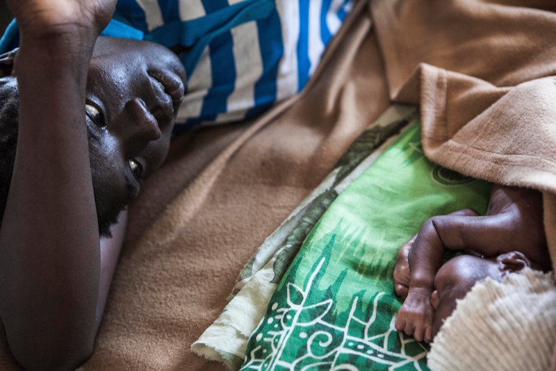 A new mother and baby rest in Aweil State Hospital. Photo by Yann Libessart/MSF
